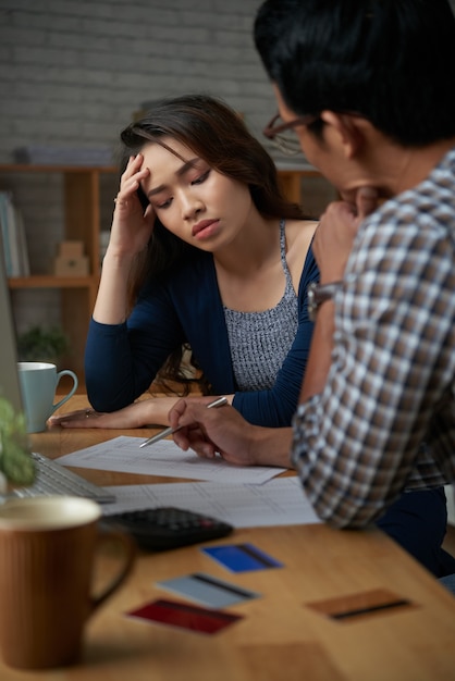 Woman distressed with household expenses and mortgage payment