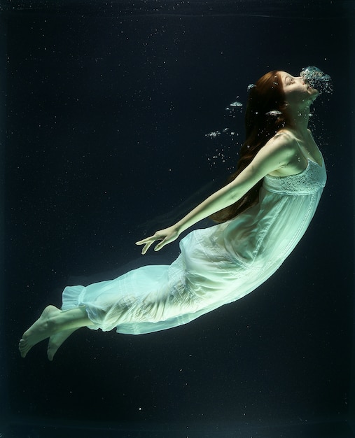 Woman diving into the water tank