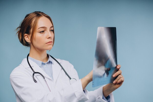 Woman doctor looking at xray picture