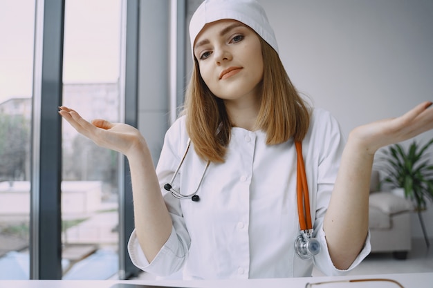 Woman doctor recording vlog video about medicin