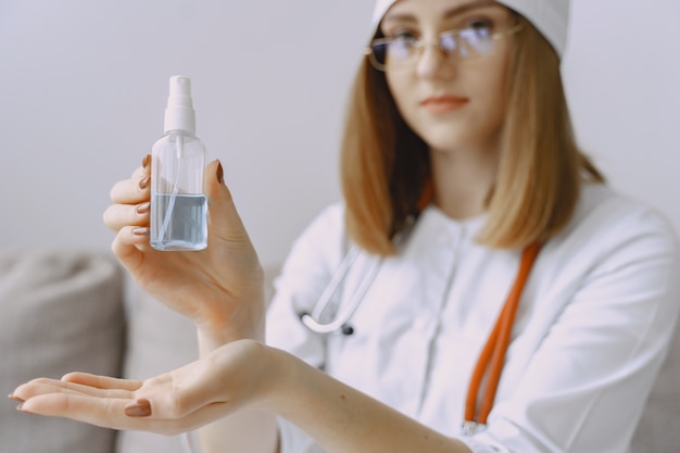 Woman doctor with white coat in hospital