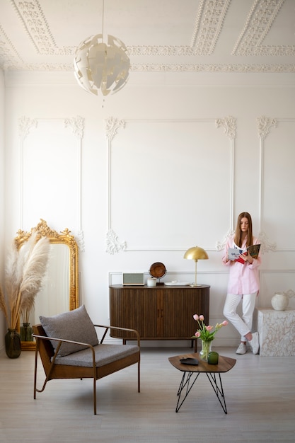 Woman doing daily activities in minimal decorated room