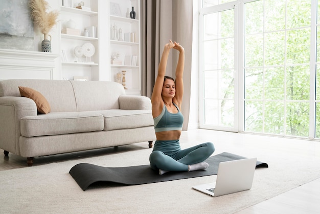 Woman doing her workout at home