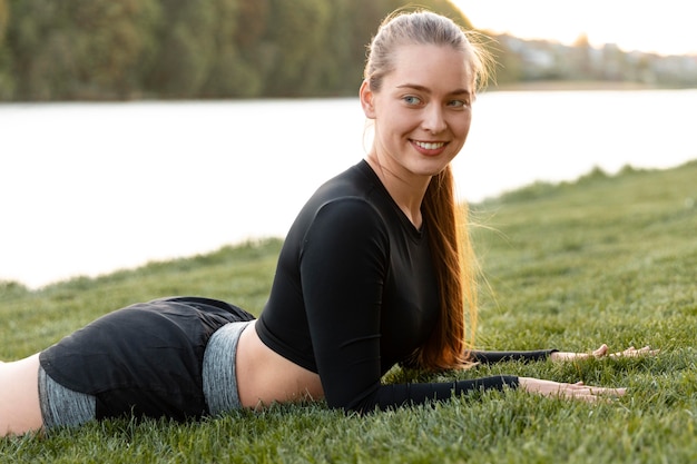 Woman doing her workout outdoors alone