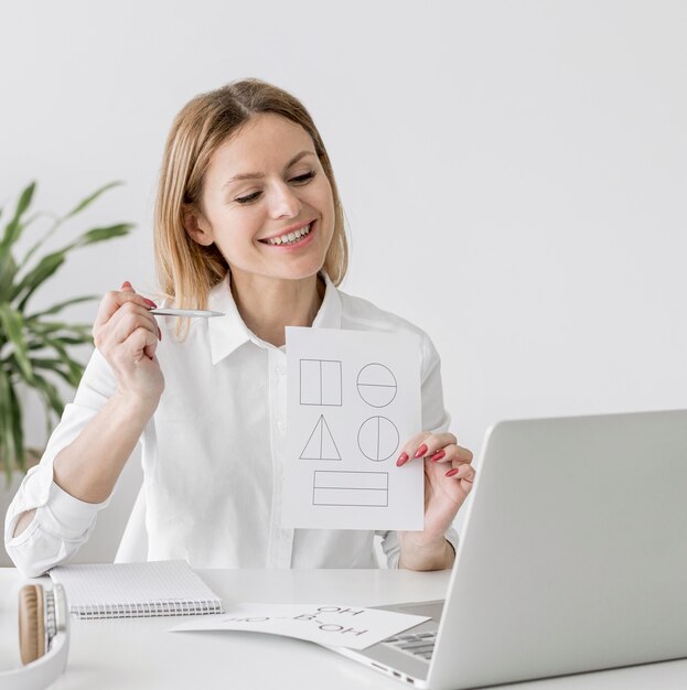 Woman doing an online class at home