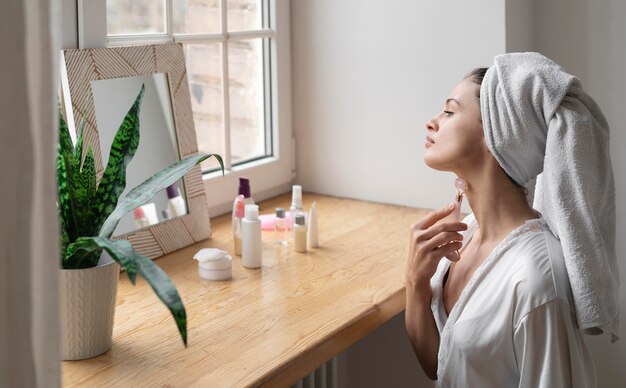 Woman doing a self care treatment indoors