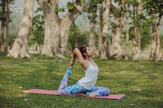 Woman doing yoga outdoors