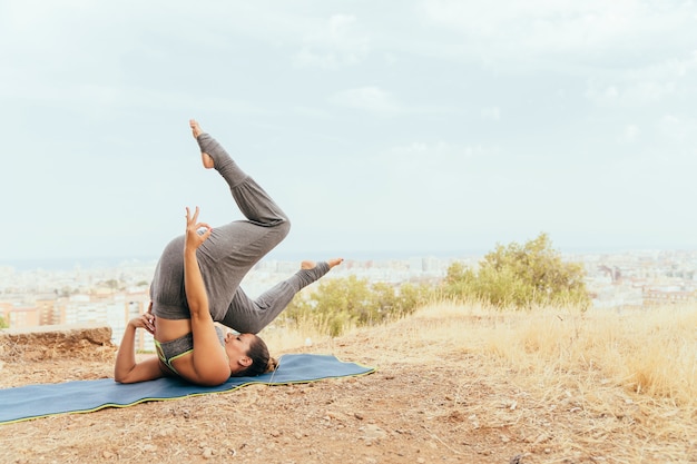 Woman doing yoga with legs up