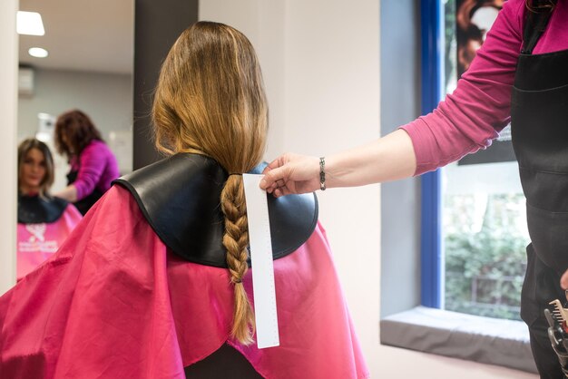 Woman donating hair for cancer