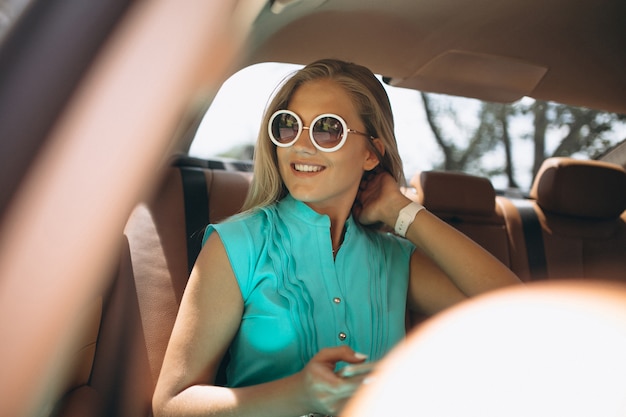 Free photo woman driving in car