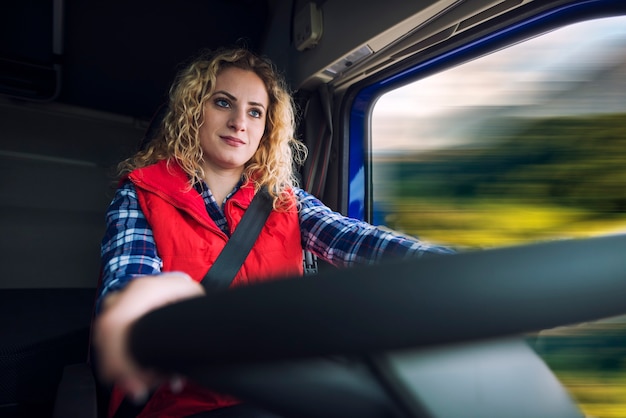 Woman driving truck vehicle