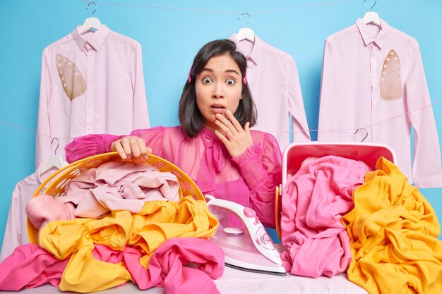 Woman at dry cleaners. Ironing concept