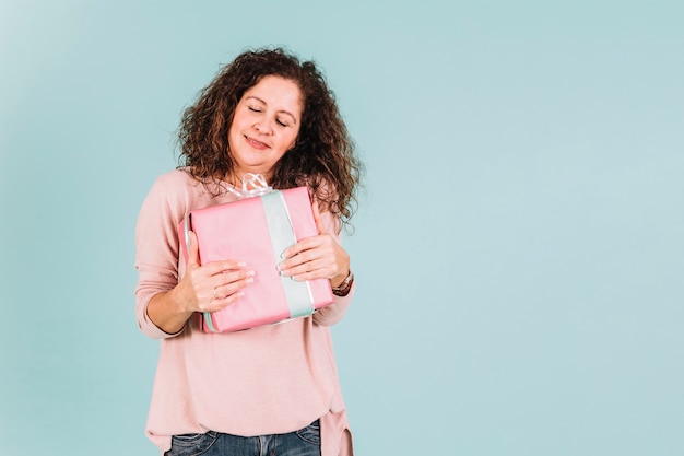 Woman embracing present