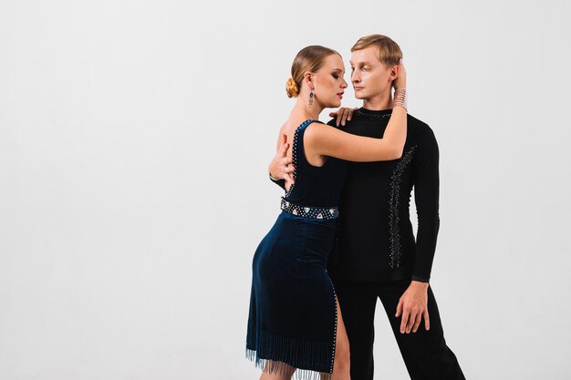 Woman embracing and touching dance partner