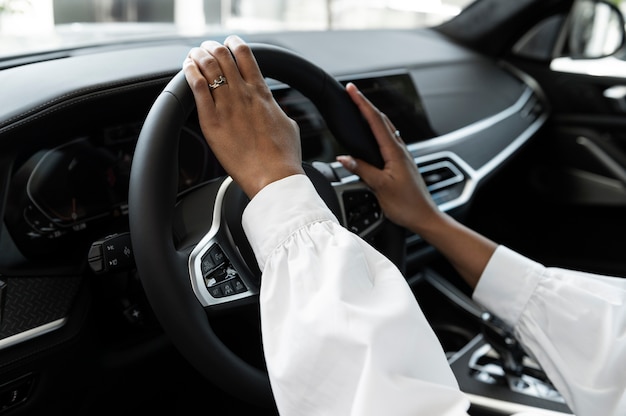 Woman enjoying her financially independence while buying car