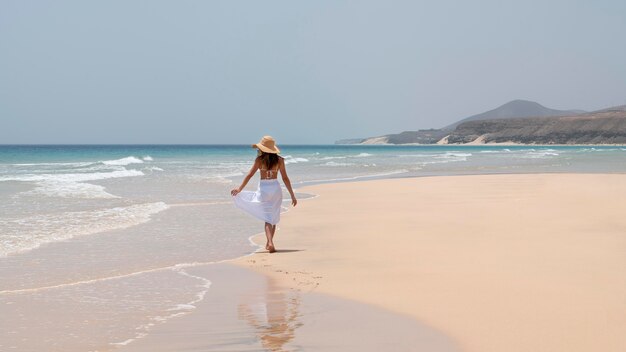 Woman enjoying her vacation on a beach