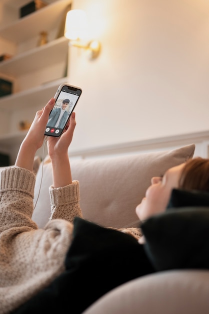 Free photo woman enjoying her virtual date