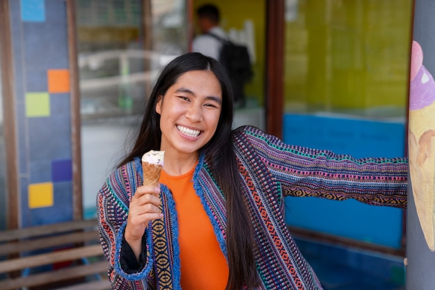 Woman enjoying ice cream outdoors