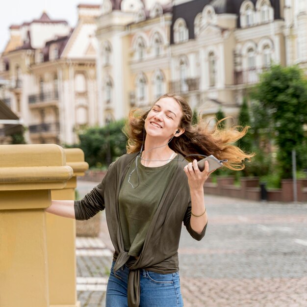 Woman enjoying music and dancing