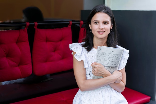 Woman enjoying a sudoku game alone