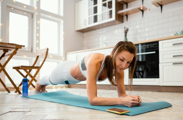 Woman exercising at home