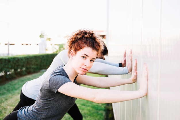 Free photo woman exercising near man