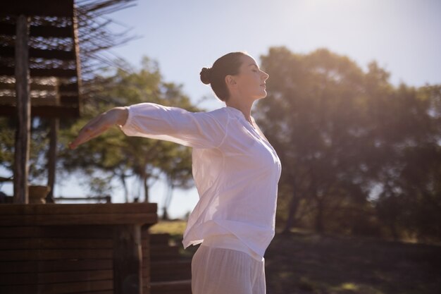 Woman exercising during safari vacation