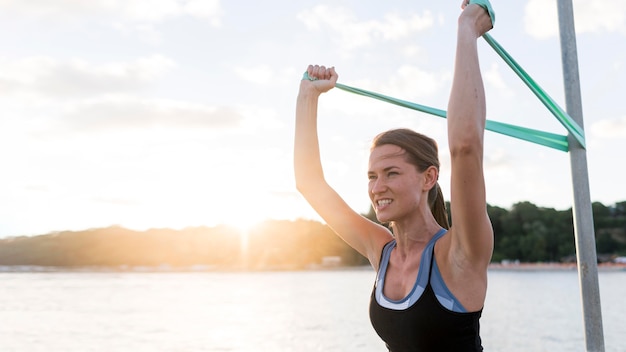 Woman exercising with copy space