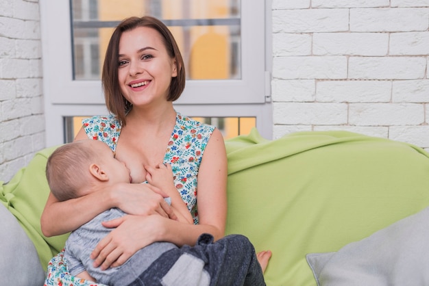 Woman feeding her son