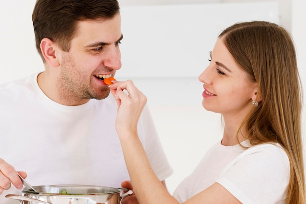 Woman feeding man