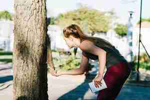 Free photo woman feeding squirrel