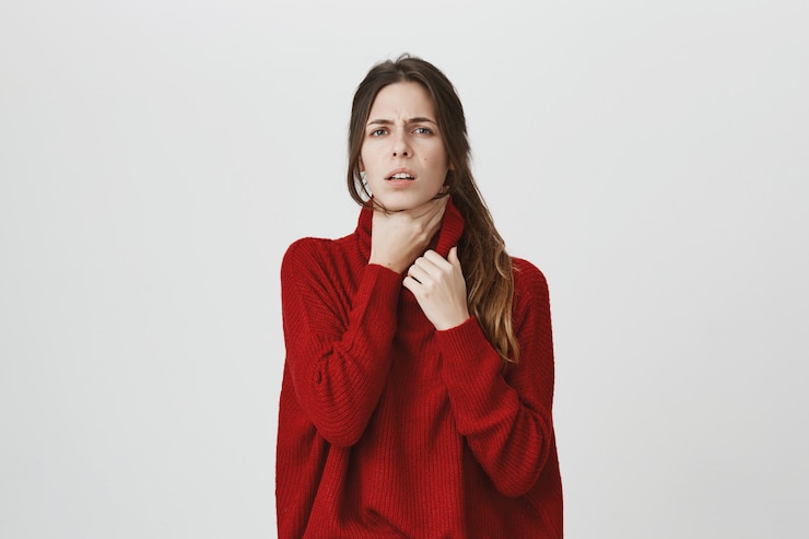 Free Photo woman feel sick, touch neck, have sore throat