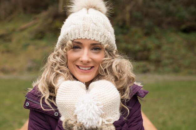 Woman feeling cold in the forest