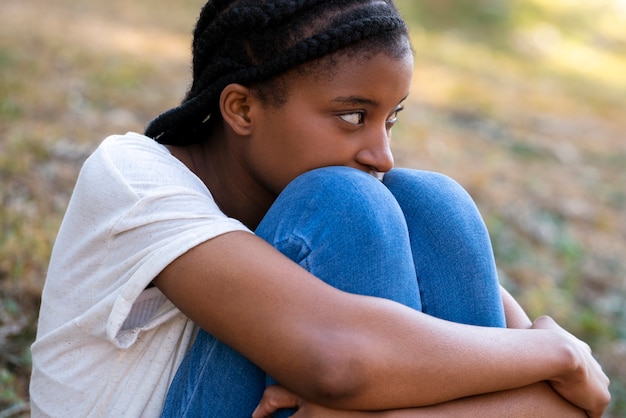 Free photo woman feeling sad for being judged and criticized by people