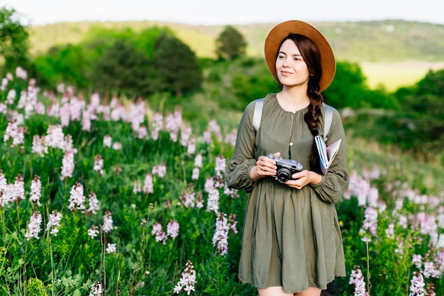 Woman on field with camera