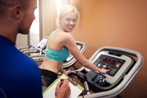 Woman flirting with her personal trainer