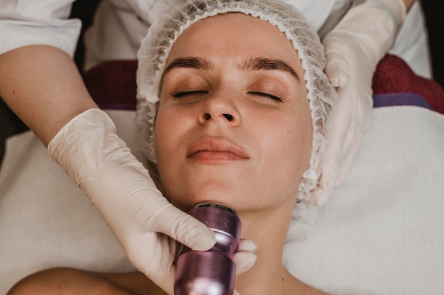 Woman getting a cosmetic treatment