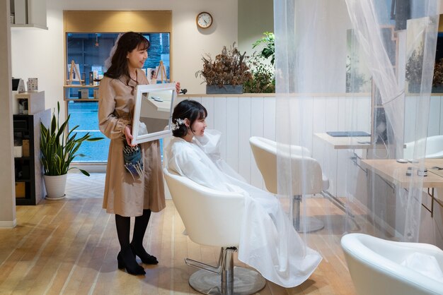 Woman getting her hair done at a japanese hairdressers