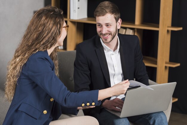 Woman getting interviewed by man for a job position