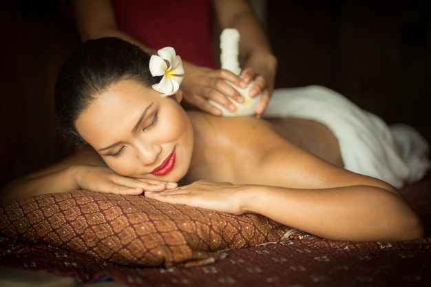 Woman getting a massage from another person