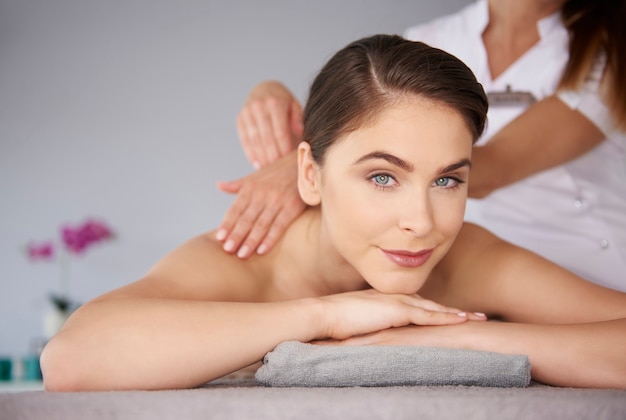 Woman getting massage at spa