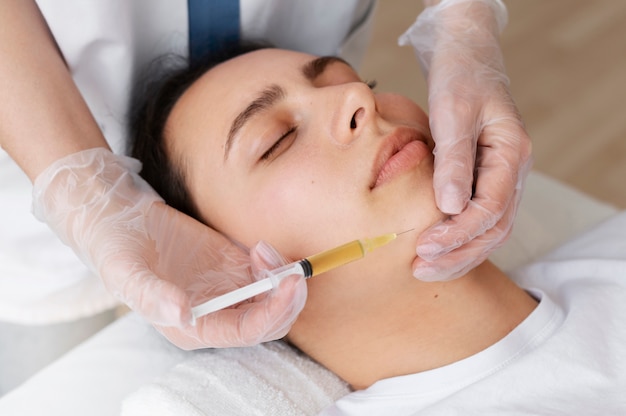 Woman getting prp treatment high angle