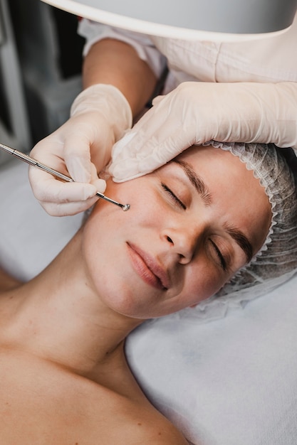 Woman getting a skincare procedure at the wellness center