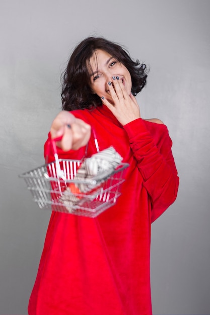 Free photo woman giving basket with gift box