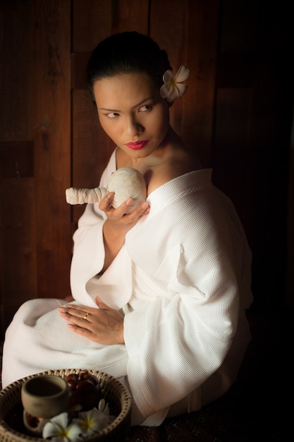 Woman giving herself a massage