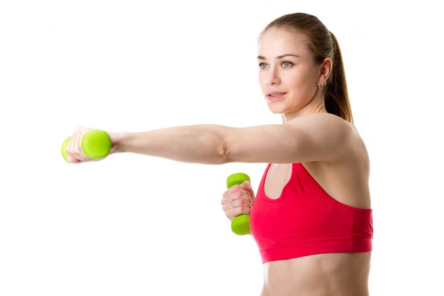 Woman giving a punch with weights