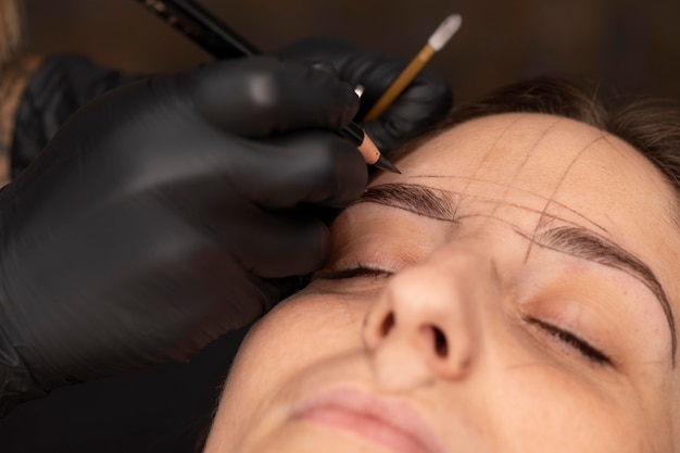 Woman going through a microblading treatment