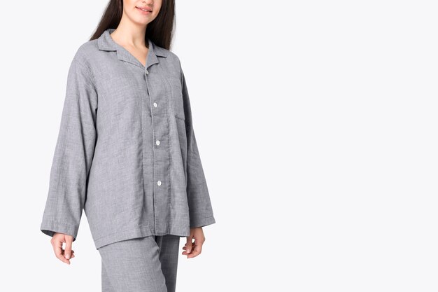 Woman in gray pajamas nightwear studio shoot