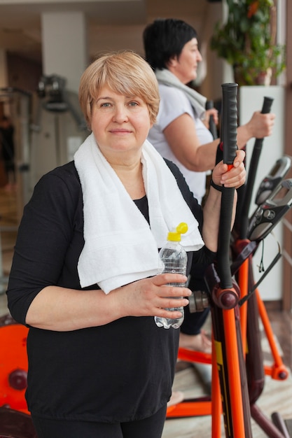 Woman at gym hydrating