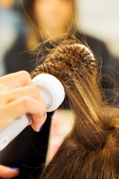 Woman at the hairdresser salon